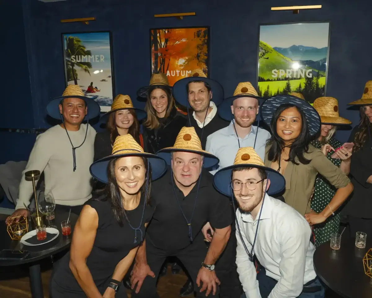 A private function at Shelanous, guests in straw hats